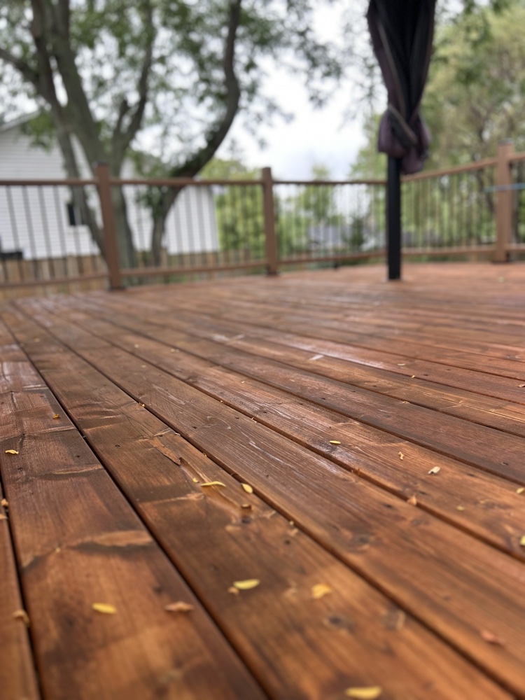 Restored and oiled wood deck boards with warm natural grain