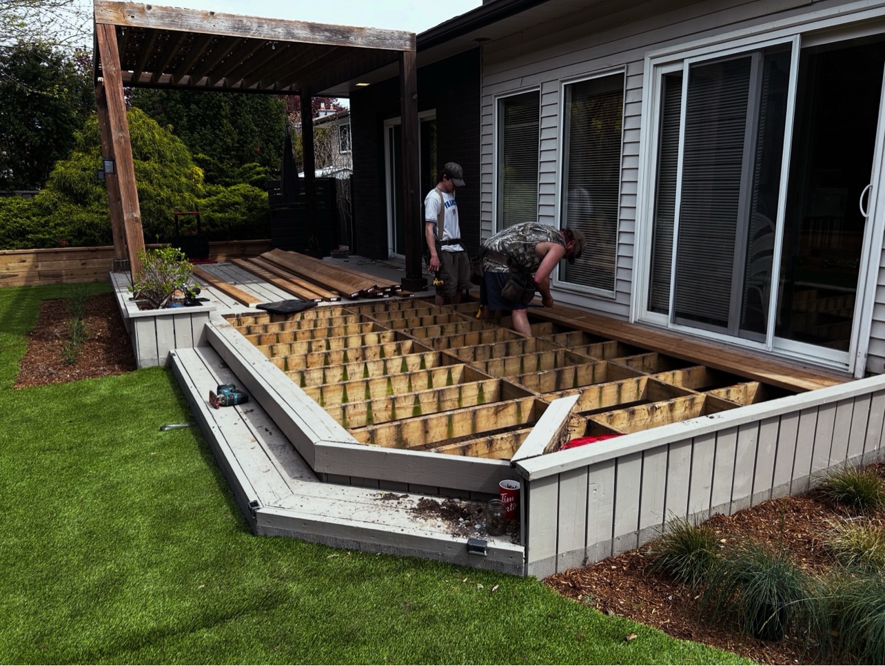 Deck stripped down to the joists while the crew re-boards